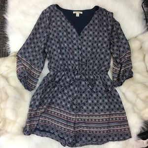 Francesca’s Miami Navy Patterned Romper with Belt